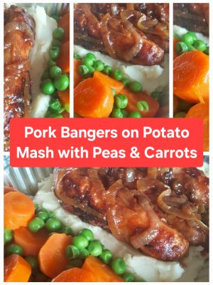 Pork Bangers on Potato Mash with Peas and Carrots